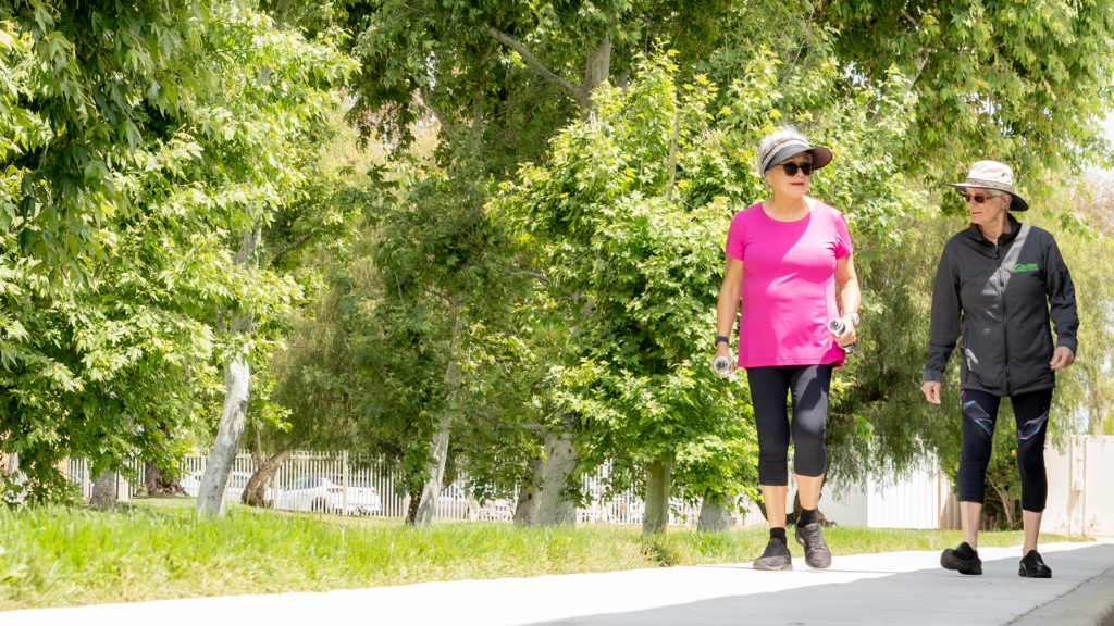 senior women on a walk at the village